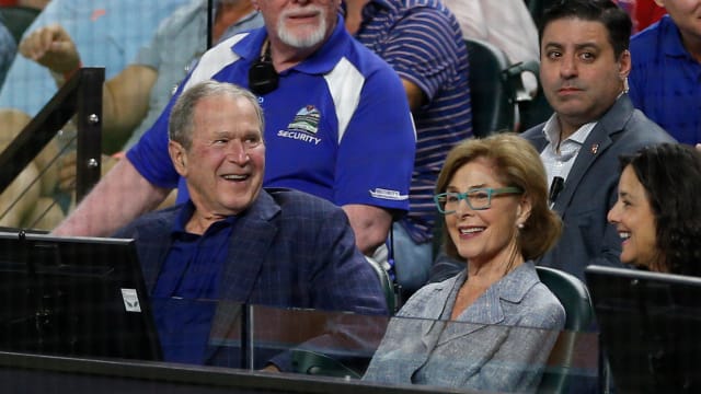 Oct 10, 2023; Arlington, Texas, USA; Former president George Bush and his wife Laura Bush watch the second inning between the Texas Rangers and the Baltimore Orioles during game three of the ALDS for the 2023 MLB playoffs at Globe Life Field. Mandatory Credit: Andrew Dieb-USA TODAY Sports